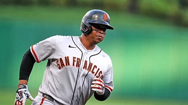 Rafael Devers hits 32nd homer, extends hit streak to 10 games as Giants beat Pirates 5-4 in 10