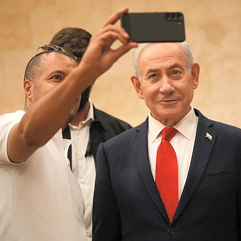 With his eye on reelection, Israel's Netanyahu turns his focus to his divided base