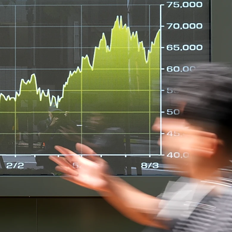 Oil prices edge lower, while Asian shares rise, tracking Wall Street gains