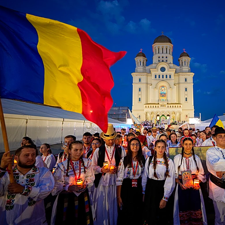 Young Orthodox Christians take part in a lights procession in Romania’s capital