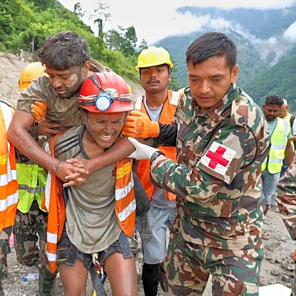 2 trapped workers rescued from a hydropower tunnel 9 days after Nepal floods
