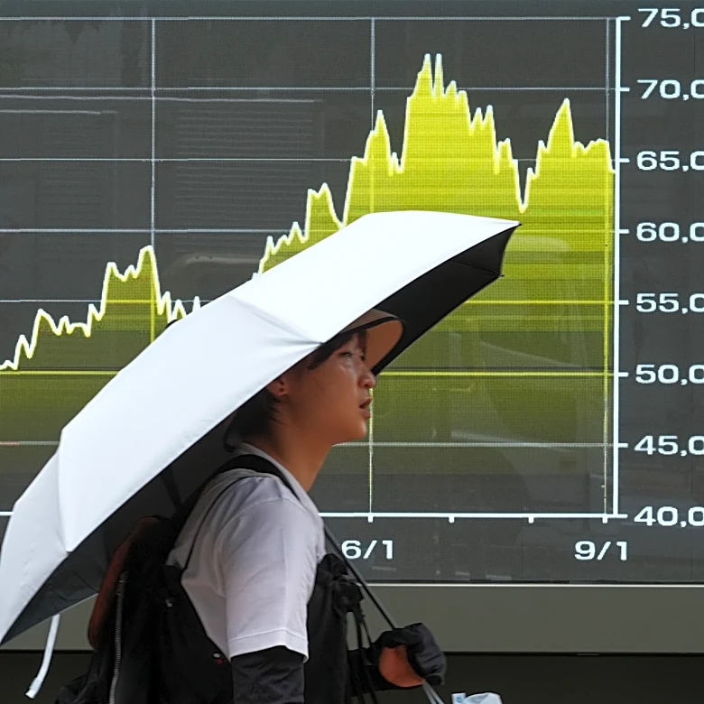 Asian benchmarks trade mixed following rally on Wall Street led by technology issues