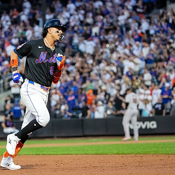 Alvarez hits 2 homers and Mets go deep 5 times to back McLean in 10-6 win over Giants