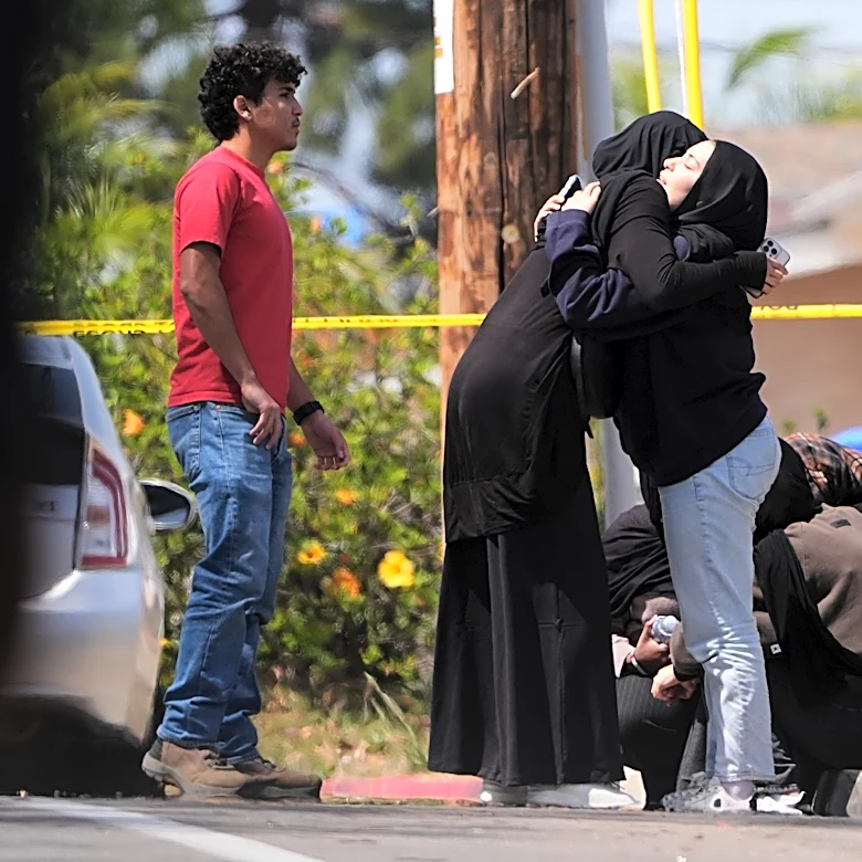 Parents of San Diego mosque gunman say a mental health facility failed to heed FBI warning