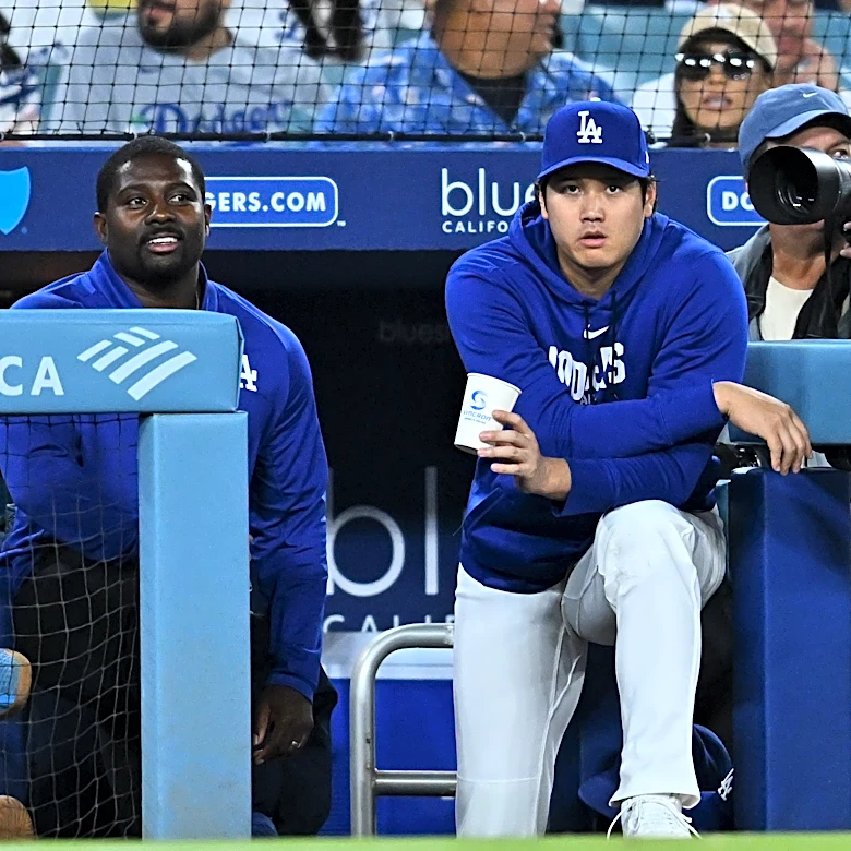 Ohtani out of Dodgers' lineup for 3rd straight day dealing with left knee, right biceps discomfort