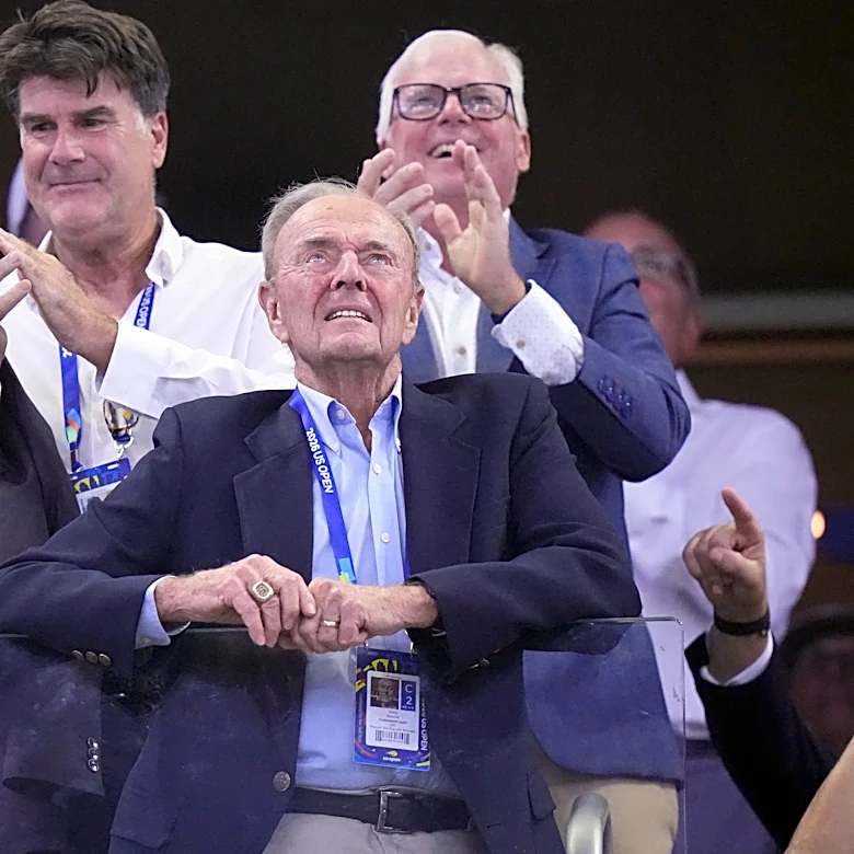 Dick Gould, who won 17 NCAA championships at Stanford, celebrated at the US Open