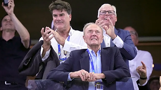 Dick Gould, who won 17 NCAA championships at Stanford, celebrated at the US Open