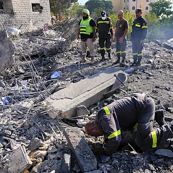 Israeli airstrikes on a village in southern Lebanon kill 9 people, wound 13
