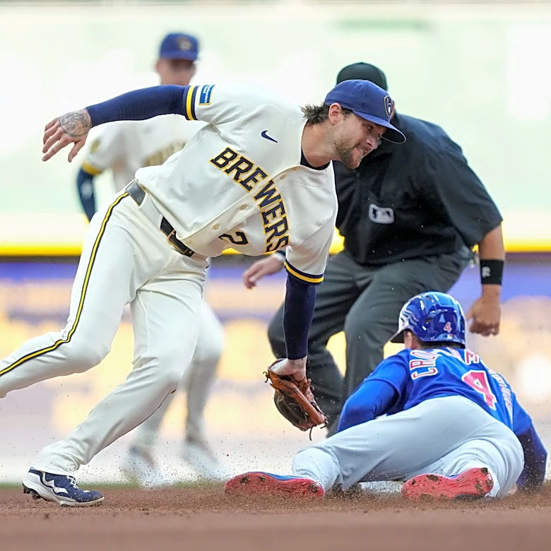Brewers rally in 8th and hold off comeback attempt in 9th for 4-3 win over Cubs