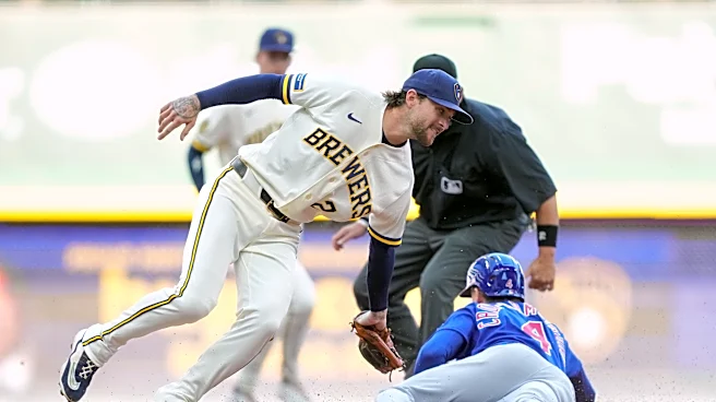 Brewers rally in 8th and hold off comeback attempt in 9th for 4-3 win over Cubs