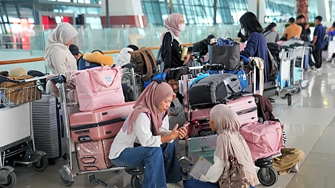 Flights to and from Indonesia’s capital resume after volcanic eruption forced a 2-day closure