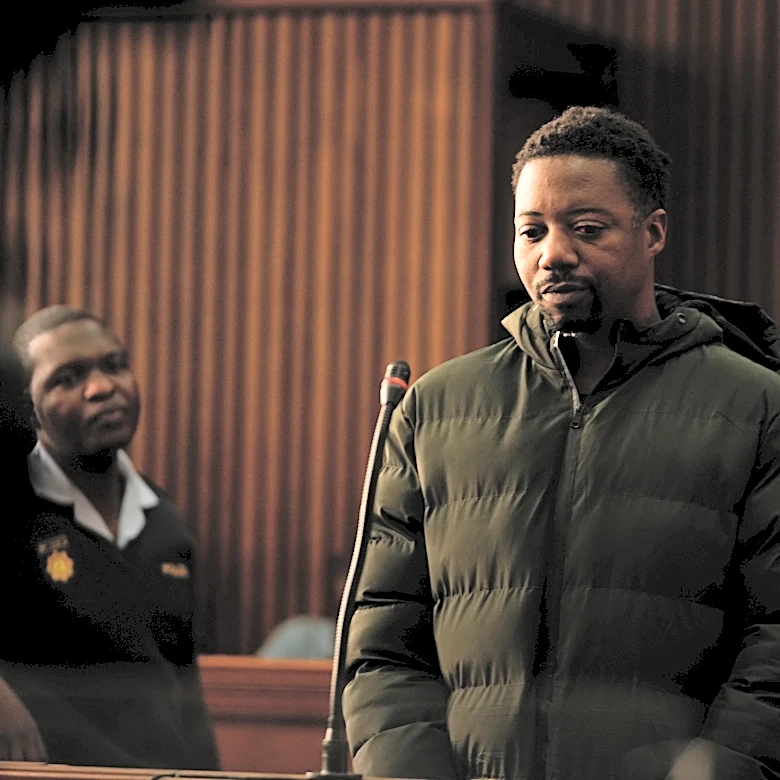 Man wanted over killings of wife and daughters in UK pleads guilty to gun offenses in South Africa