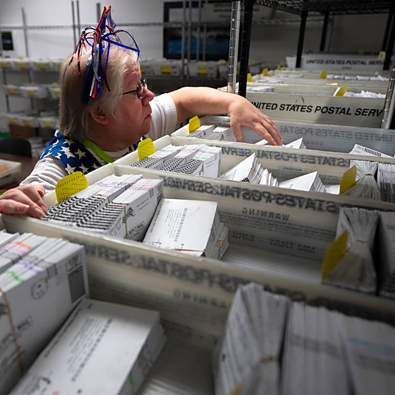 Ballots discounted for late postmarks surged in Washington and Oregon after Postal Service changes