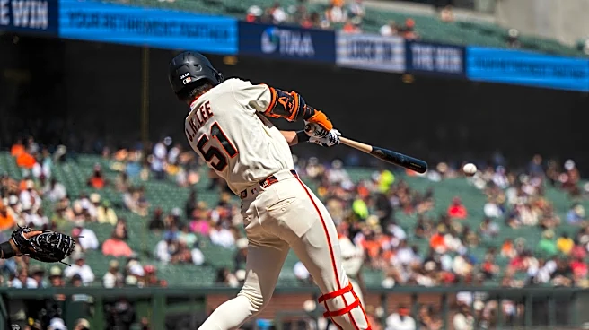 Whitcomb's double caps Giants' 6-run rally in a 7-6 victory over the Cardinals