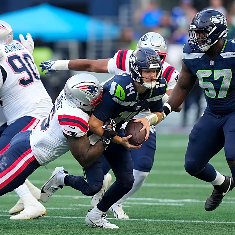 Sam Darnold injures hip on Seahawks' first series of opener and is ruled out for rest of game
