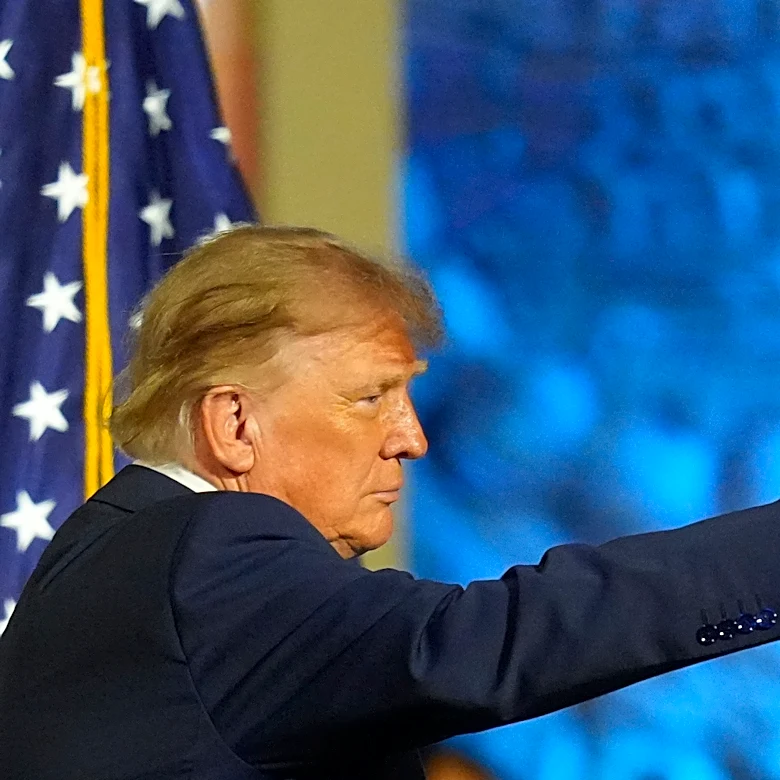 The Latest: Trump centers himself in pitch to midterm voters, promising payouts if the GOP wins