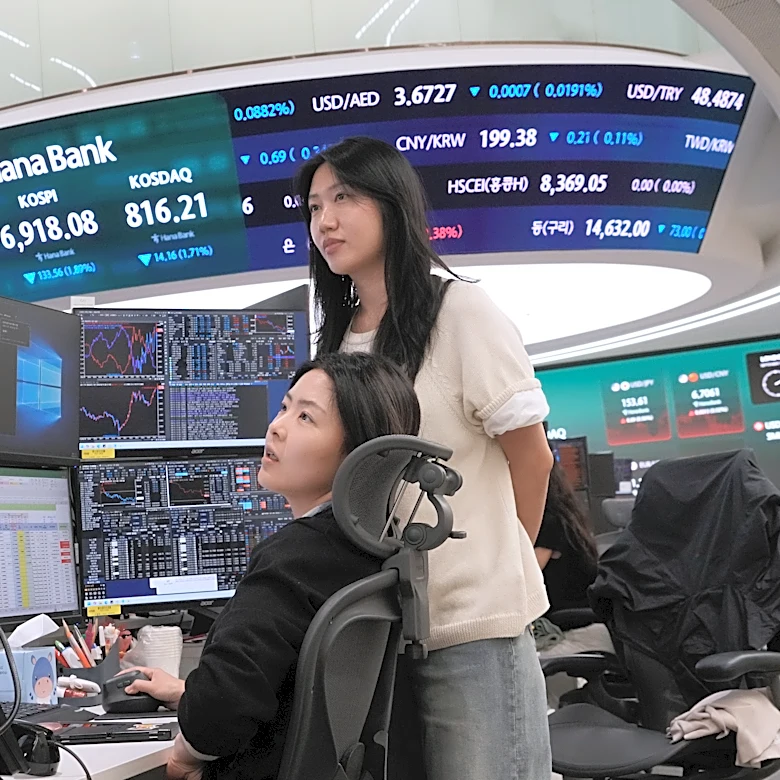 Asian shares fall and oil prices hold steady above $100 a barrel