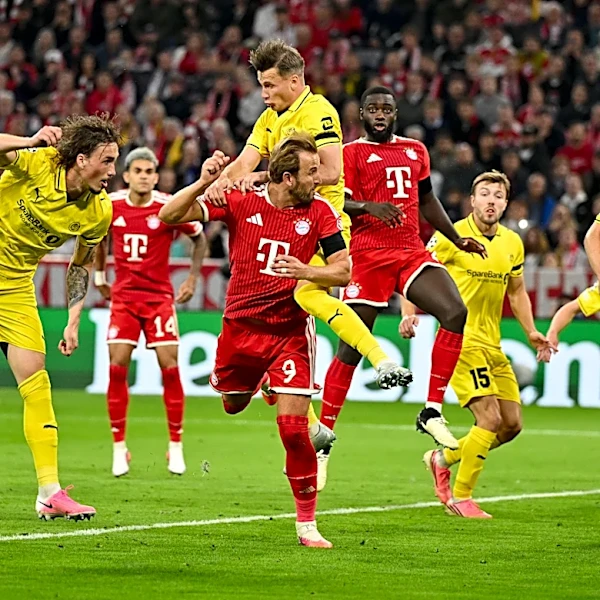 Harry Kane scores in Bayern win as Manchester United victorious on Champions League return