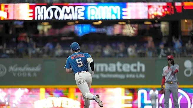 Garrett Mitchell hits grand slam and MLB-best Brewers pound Reds 20-0 to clinch playoff spot