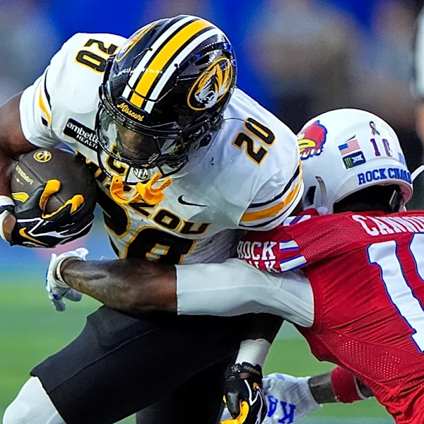 Woodyard's 2 second-half takeaways swing Border War as No. 23 Missouri beats Kansas 38-21