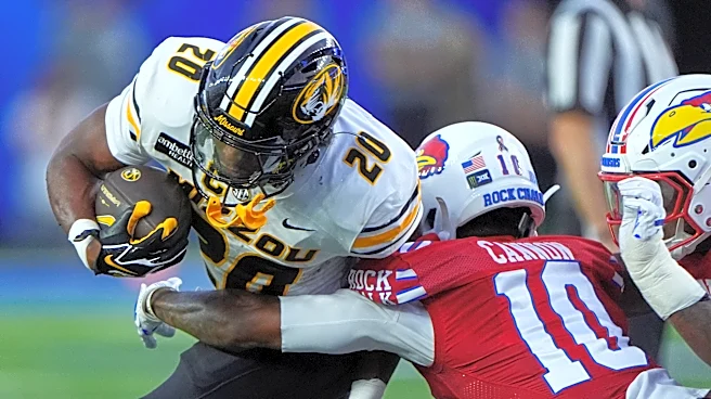 Woodyard's 2 second-half takeaways swing Border War as No. 23 Missouri beats Kansas 38-21