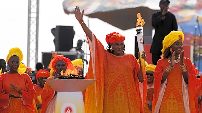 Olympic flame arrives in Senegal for Youth Games, the first Olympic event to be held in Africa