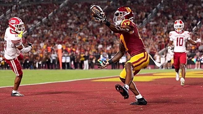 Maiava throws 5 TD passes, No. 14 Southern California beats Louisiana 49-30