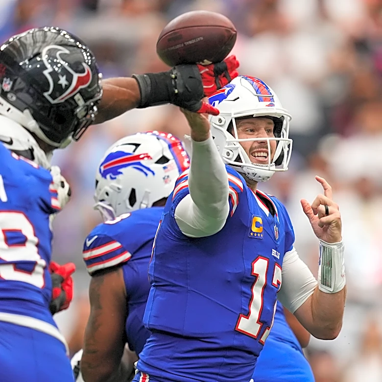 Josh Allen connects with Joshua Palmer for a late TD and Bills beat Texans 36-31 in wild opener