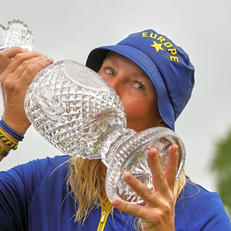 Europe beats US 15-13 in Solheim Cup. Lowry takes Irish Open by record 11 shots