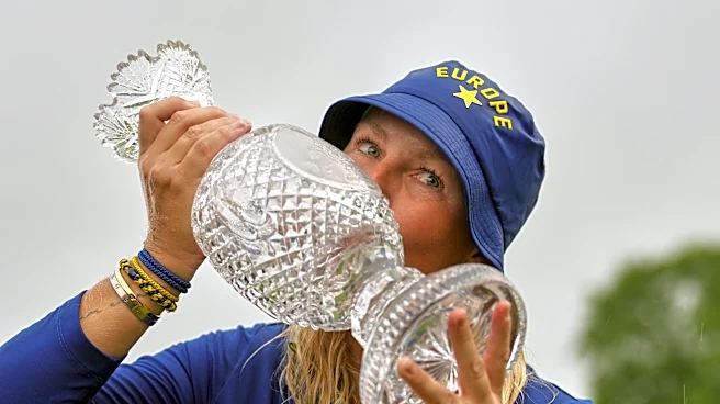 Europe beats US 15-13 in Solheim Cup. Lowry takes Irish Open by record 11 shots