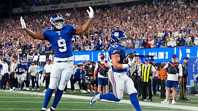 Giants' offense rolls over the Cowboys to give coach John Harbaugh a 28-20 win in his debut