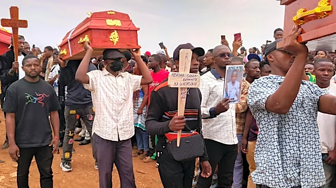 Hundreds gather in eastern Congo to mourn victims of school fires