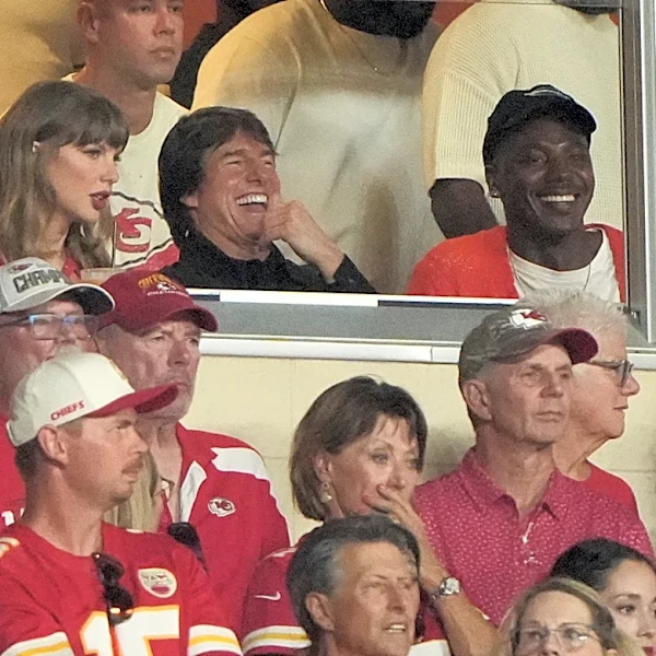 Taylor Swift skips the Emmys for Arrowhead, cheering on hubby Travis Kelce alongside Tom Cruise