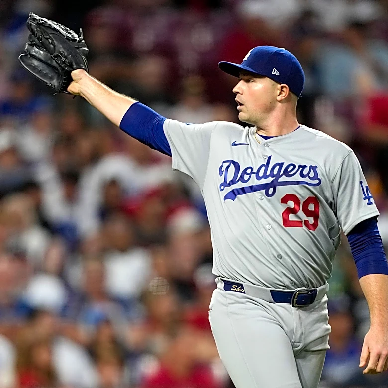 A quiet toast as the Dodgers clinch record-tying 14th straight playoff spot