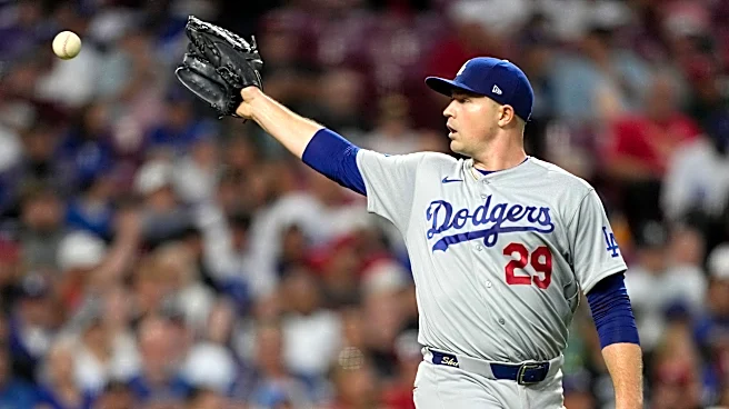A quiet toast as the Dodgers clinch record-tying 14th straight playoff spot