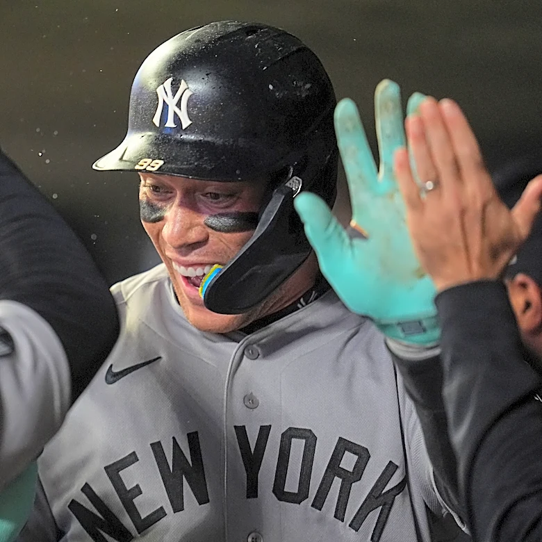 Judge's first homer since May 24 helps clinch postseason berth for Yankees in 8-3 win at Twins