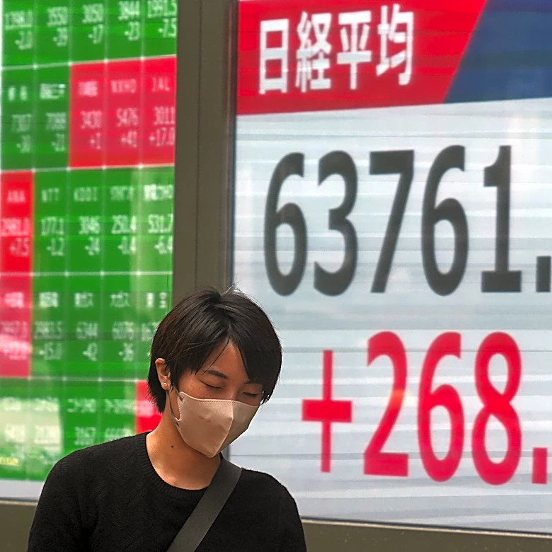 Asian shares trade mostly lower after AI stocks sink on Wall Street