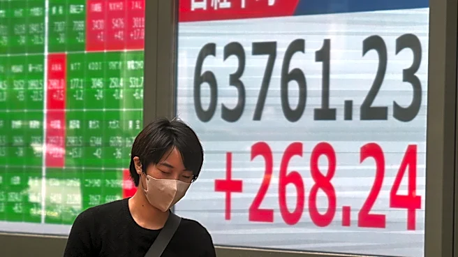 Asian shares trade mostly lower after AI stocks sink on Wall Street