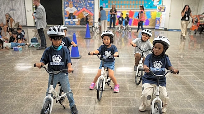 A childhood rite moves indoors as kindergartners learn to ride bikes in school gyms