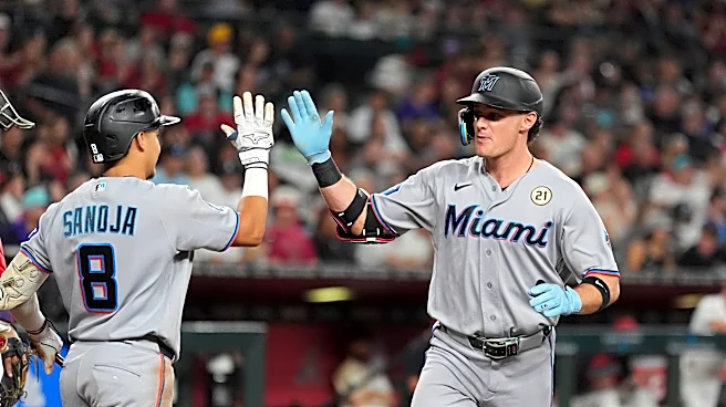 Esteury Ruiz hits 3-run double in 11th to lift Marlins to 4-2 win, damaging D-backs' playoff hopes