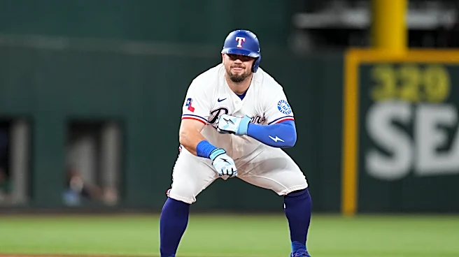 Rangers reach .500 again and tie for AL West lead with 7-3 victory over Red Sox