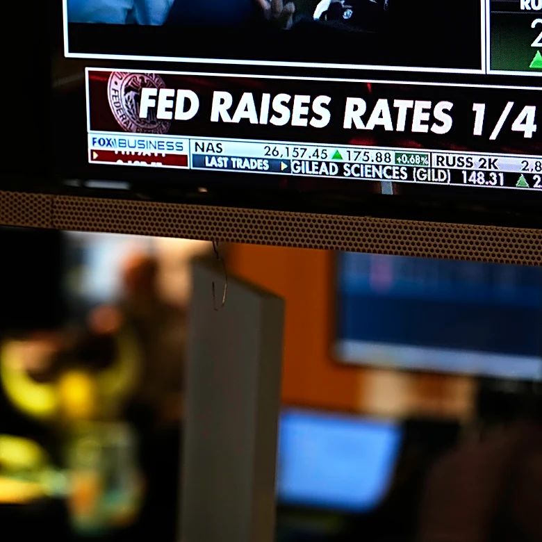 US futures climb after Fed takes a hawkish turn on inflation