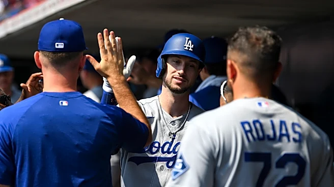 Dodgers clinch 5th straight NL West title, 13th in 14 years, Tucker has 4 hits in 8-2 win over Reds