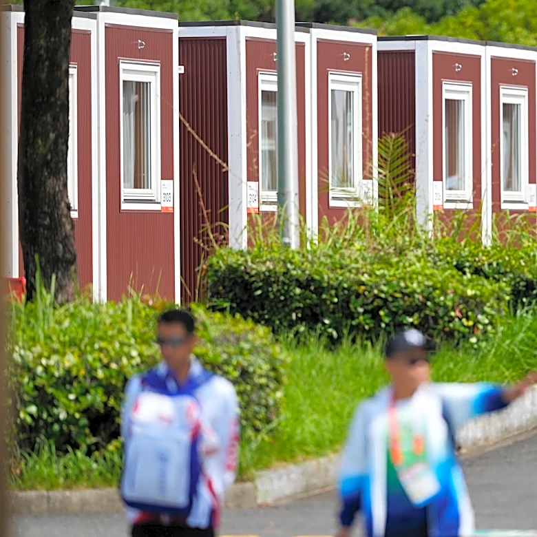 Officials defend using temporary containers, cruise ship as lodging at Asian Games