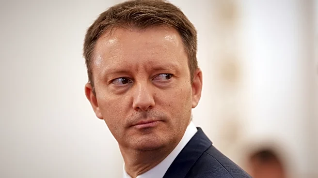 Romania's prime minister-designate teams up with 3 parties in a bid to form cabinet