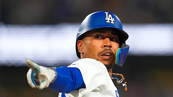 Mookie Betts homers twice and Dodgers go back-to-back twice in 8th inning of 8-2 win over Giants