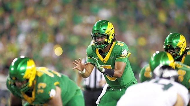 Moore throws for 4 TD passes as No. 21 Oregon routs Portland State 84-0