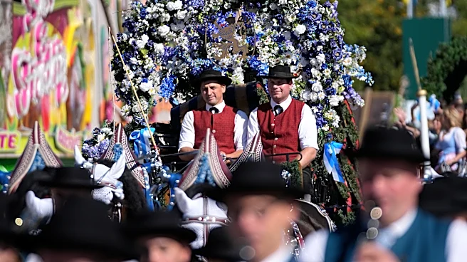 Munich’s Oktoberfest roars to life as the mayor taps the first keg