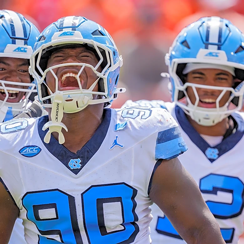 North Carolina leads Clemson 17-15 in fourth quarter in game delayed by lightning