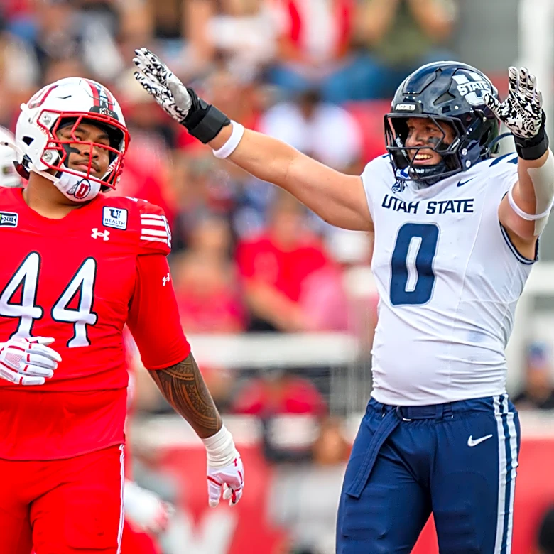 Utah State's Taggart leaves field in an ambulance; in concussion protocol and has a neck injury